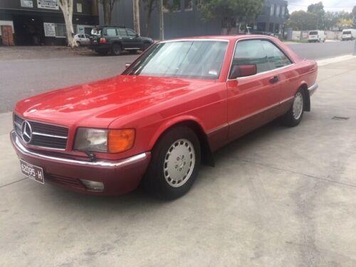 Mercedes 560SEC C126 classic Signal red over burgundy images (2).jpg