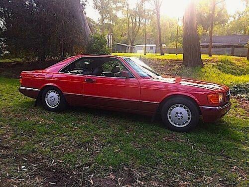 Mercedes 560SEC C126 classic Signal red over burgundy images (6).jpg