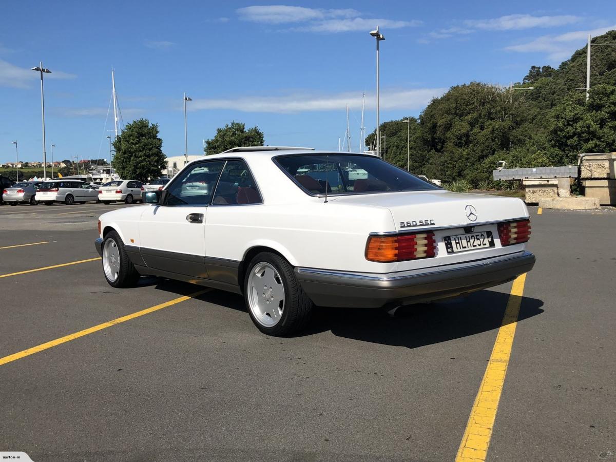 Mercedes 560SEC white on grey with maroon interior images (4).jpg