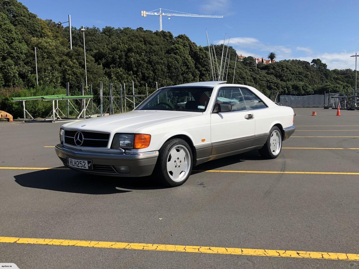 Mercedes 560SEC white on grey with maroon interior images (6).jpg