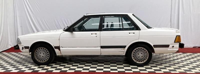 Nissan Bluebird 80s TRX images white (7).jpg