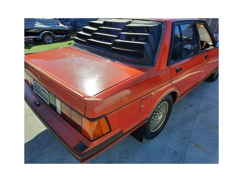 Nissan P910 TR-X TRX 1984 sedan red images  (19).jpg