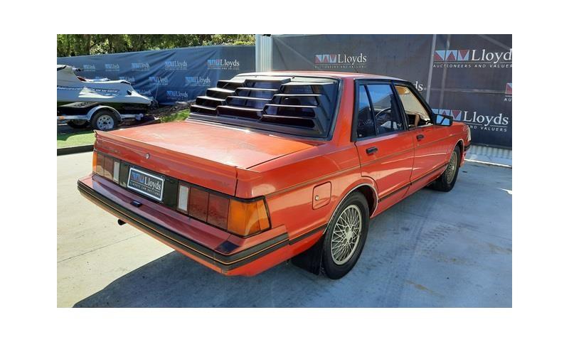 Nissan P910 TR-X TRX 1984 sedan red images  (8).jpg