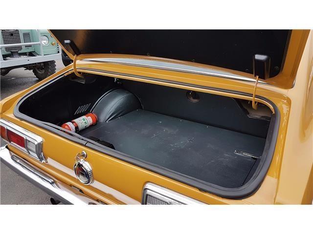 Orange 1971 Datsun 1200 coupe original restored images (10).jpg