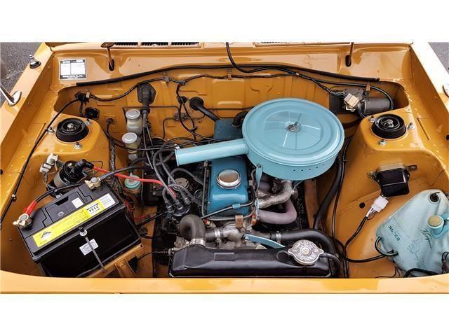Orange 1971 Datsun 1200 coupe original restored images (13).jpg