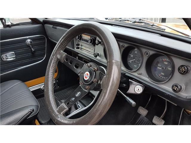 Orange 1971 Datsun 1200 coupe original restored images (16).jpg