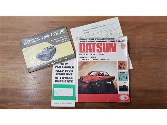 Orange 1971 Datsun 1200 coupe original restored images (18).jpg