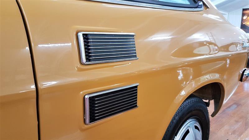 Orange 1971 Datsun 1200 coupe original restored images (2).jpg