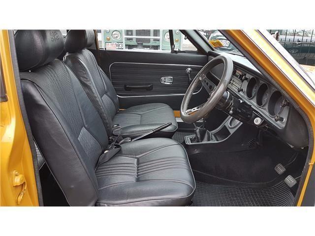 Orange 1971 Datsun 1200 coupe original restored images (7).jpg