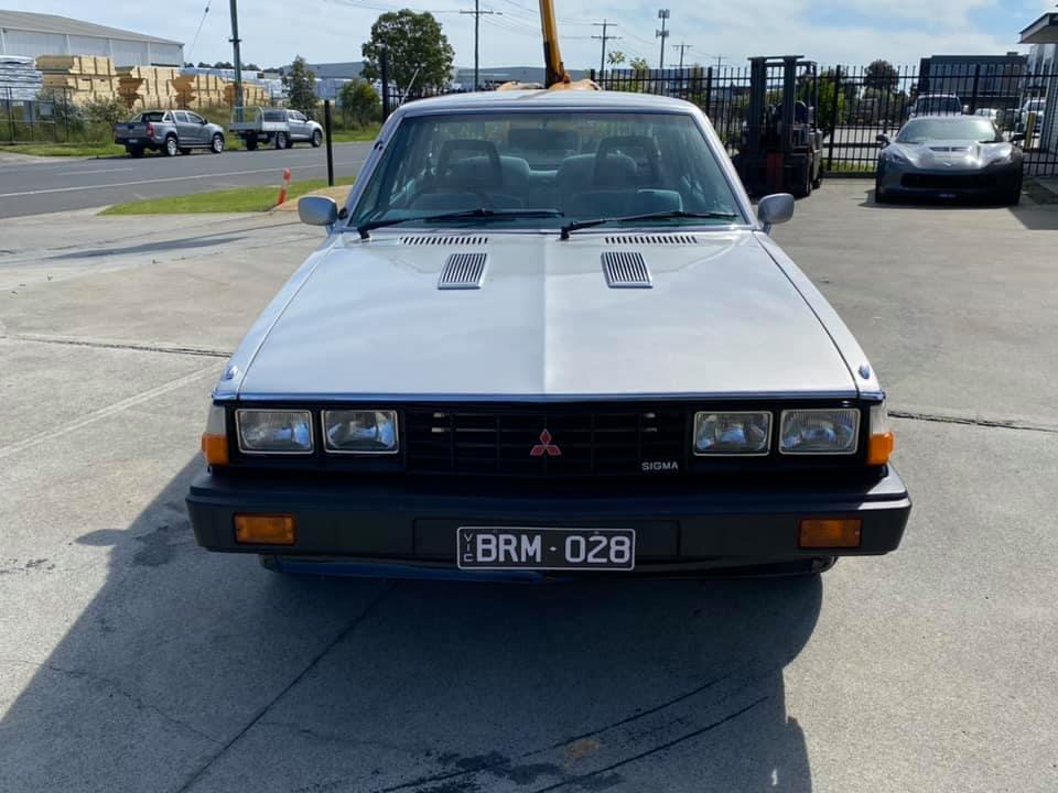 Silver over black 1981 Mitsubishi Sigma Turbo Sedan restored modified for sale (9).jpg