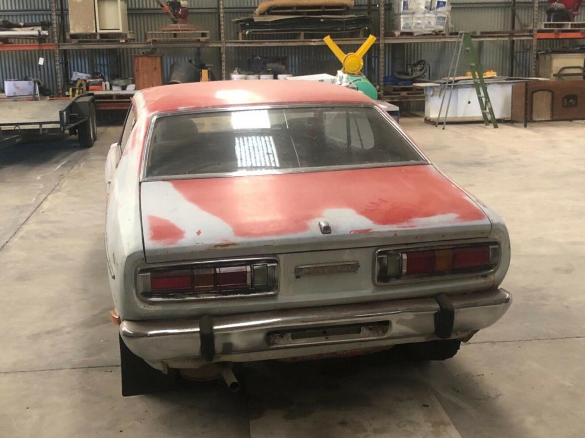 Unrestored Datsun 180B SSS Australia coupe red paint pics (1).jpg