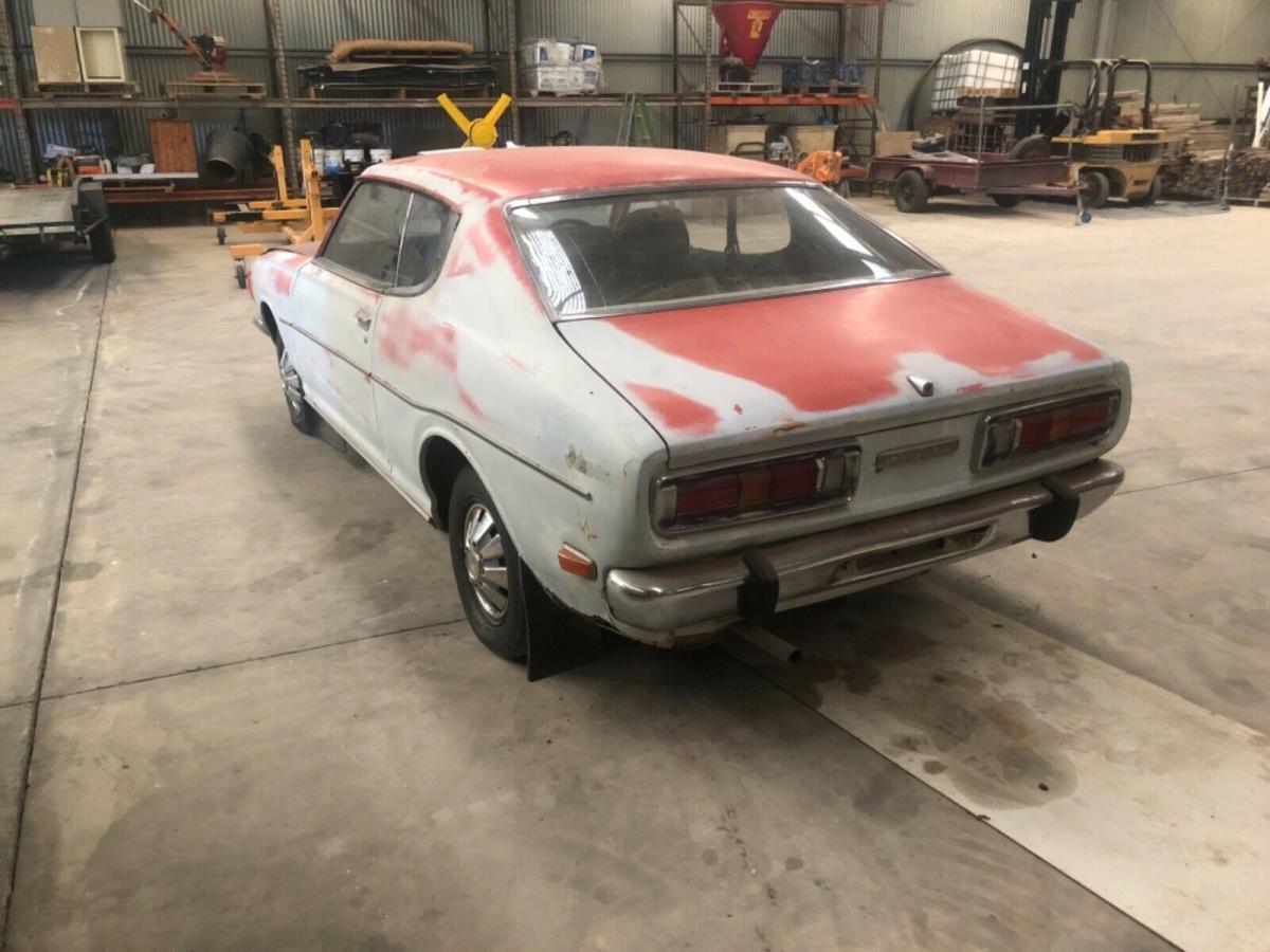 Unrestored Datsun 180B SSS Australia coupe red paint pics (6).jpg