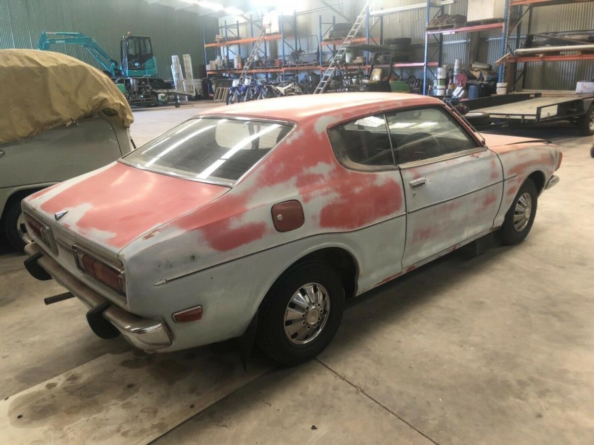 Unrestored Datsun 180B SSS Australia coupe red paint pics (7).jpg