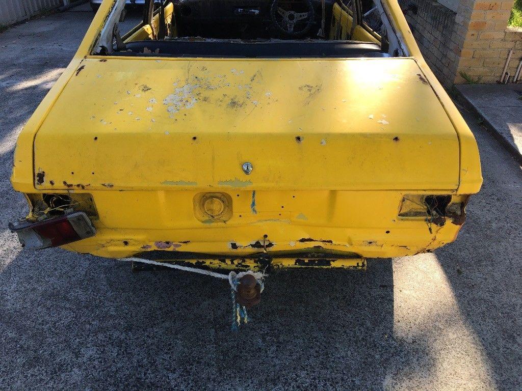 Yellow MK2 RS2000 sedan Australia escort shell unrestored images (2).jpg