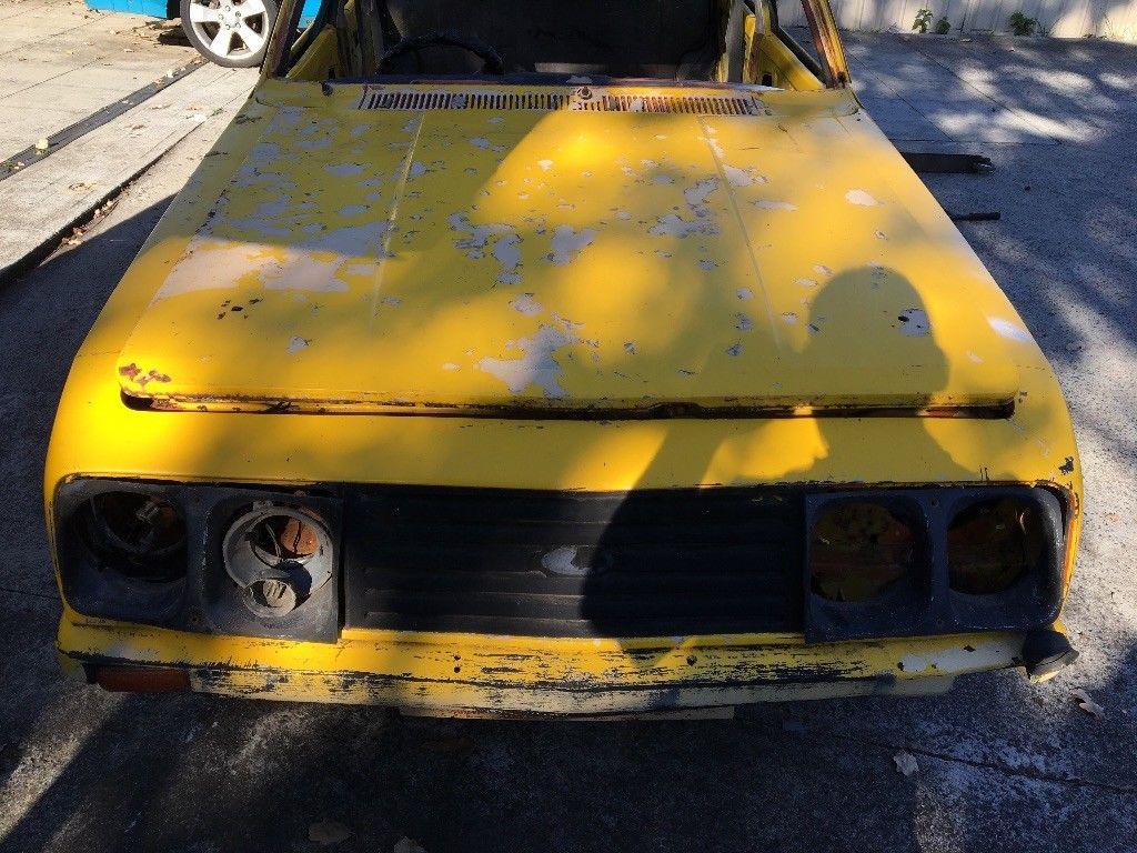 Yellow MK2 RS2000 sedan Australia escort shell unrestored images (5).jpg