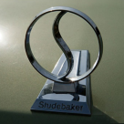 1966 Studebaker Daytona Sport Sedan 6 cylinder 3 badge.png