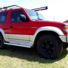 1995 SWB Gen 2 Pajero NJ red with leather images (1).jpg