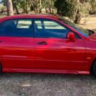 2002 Mitsubishi Magna Ralliart TJ red images build number 0037 (2).JPG