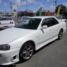 4 door R34 GT-T white Front bumper intake.jpg