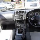 4 door R34 GT-T white Front dashboard.jpg