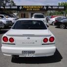 4 door R34 GT-T white Rear tail lights.jpg