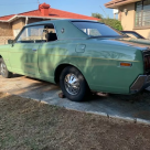 Datsun 260C Coupe 1974 green South Africa RHD rare 2 door (2).png