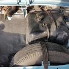 Fiat 500D spare tyre and fuel tank.jpg