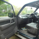 Pajero SWB 1996 NJ leather seats and woodgrain interior images (9).png