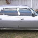 Side 1977 Ford LTD Fairlane ZH Silver Monarch Sedan (4).jpg