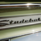 studebaker rear badge 6 cylinder.png