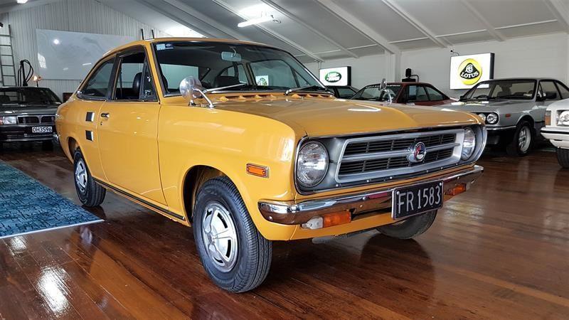 Orange 1971 Datsun 1200 coupe original restored images (3).jpg